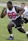 Nebraska lineman Le Kevin Smith runs during practice in Lincoln, Neb., Wednesday, Aug. 7, 2002. After missing all of last season with a torn ligament in his right knee and spring practice with a nearly identical injury to his left knee, Smith is ready to play again. (AP Photo/Nati Harnik)