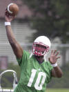 Nebraska quarterback Jammal Lord throws during team practice in Lincoln, Neb., Wednesday, Aug 7, 2002.  (AP Photo/Nati Harnik)