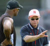 Nebraska coach Frank Solich, right, talks with receivers coach Ron Brown as afternoon practice begins near Memorial Stadium on Saturday, Aug. 3, 2002, in Lincoln, Neb. (AP Photo/Kelli Kellogg)